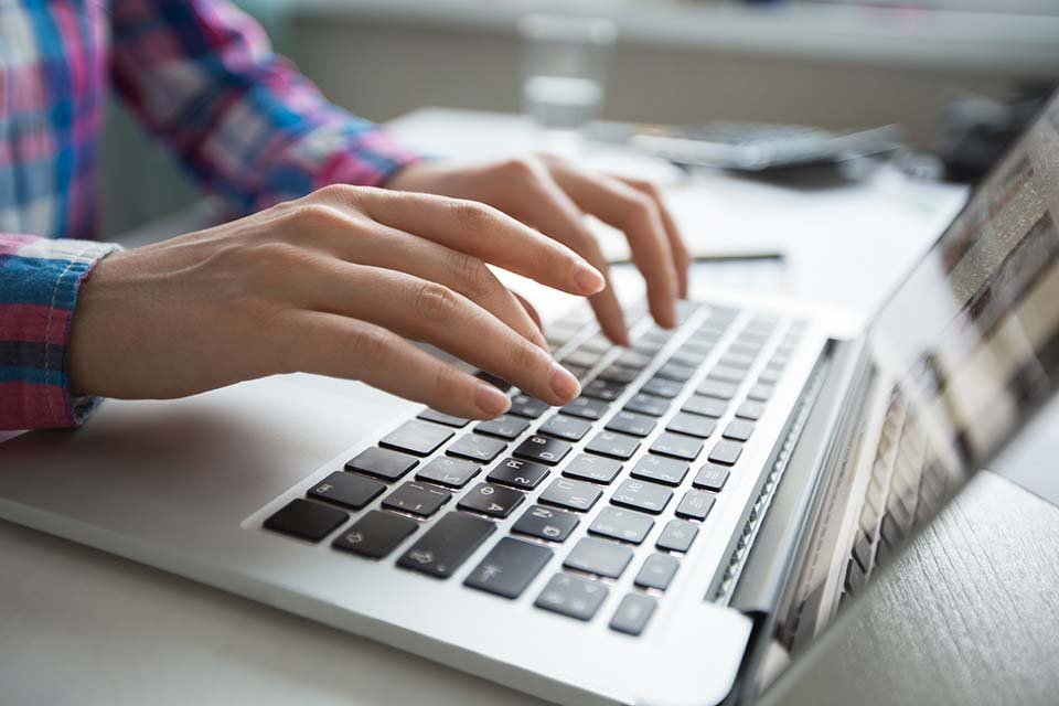 stockphotoscom-1320034 Laptop Typing-small 2